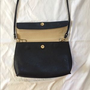 Black/cream reversible crossbody bag